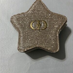 Dior Gold Star-Shaped Travel pouch